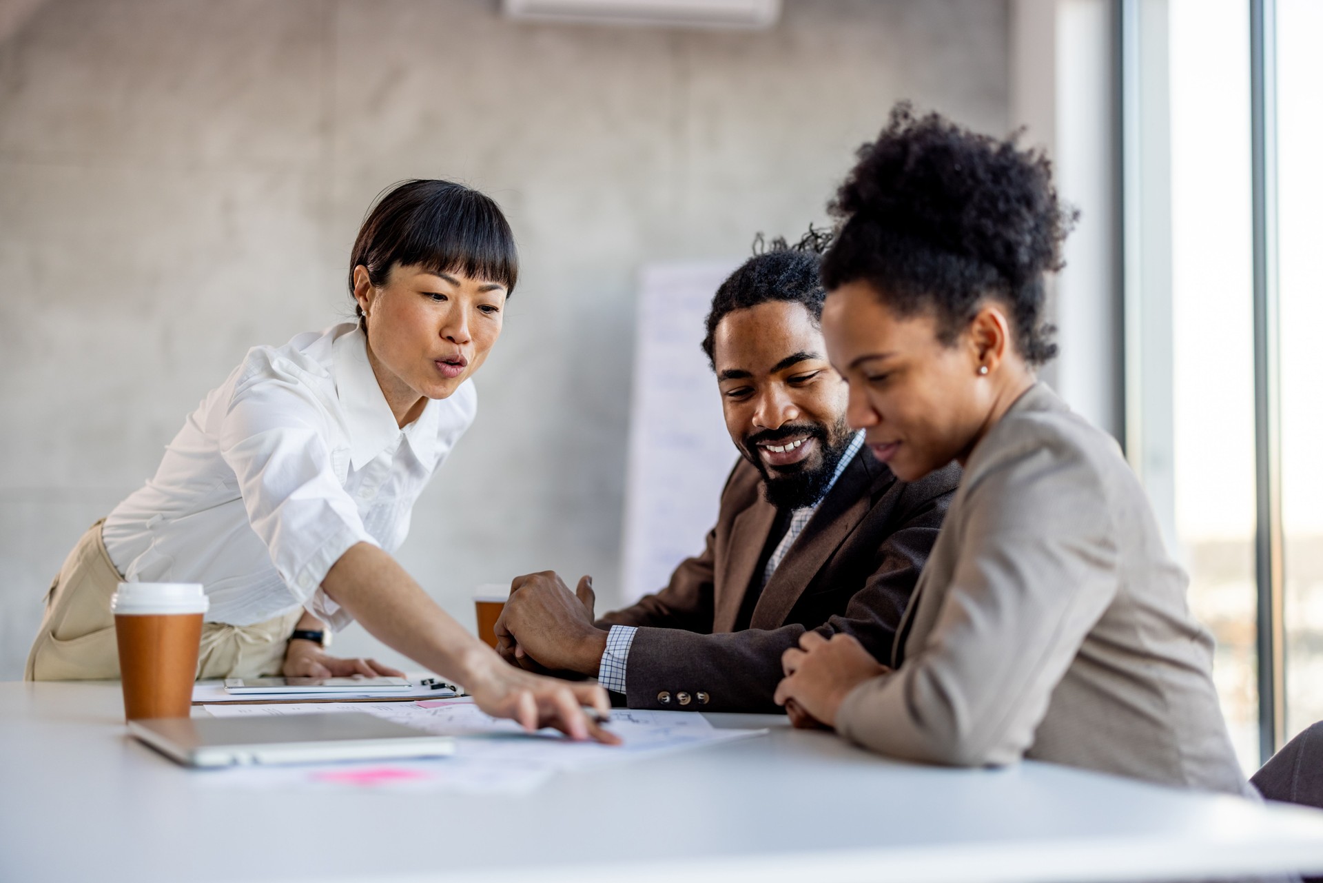 Shot of a group of businesspeople having a meeting in a boardroom Shot of a group of businesspeople having a meeting in a boardroom